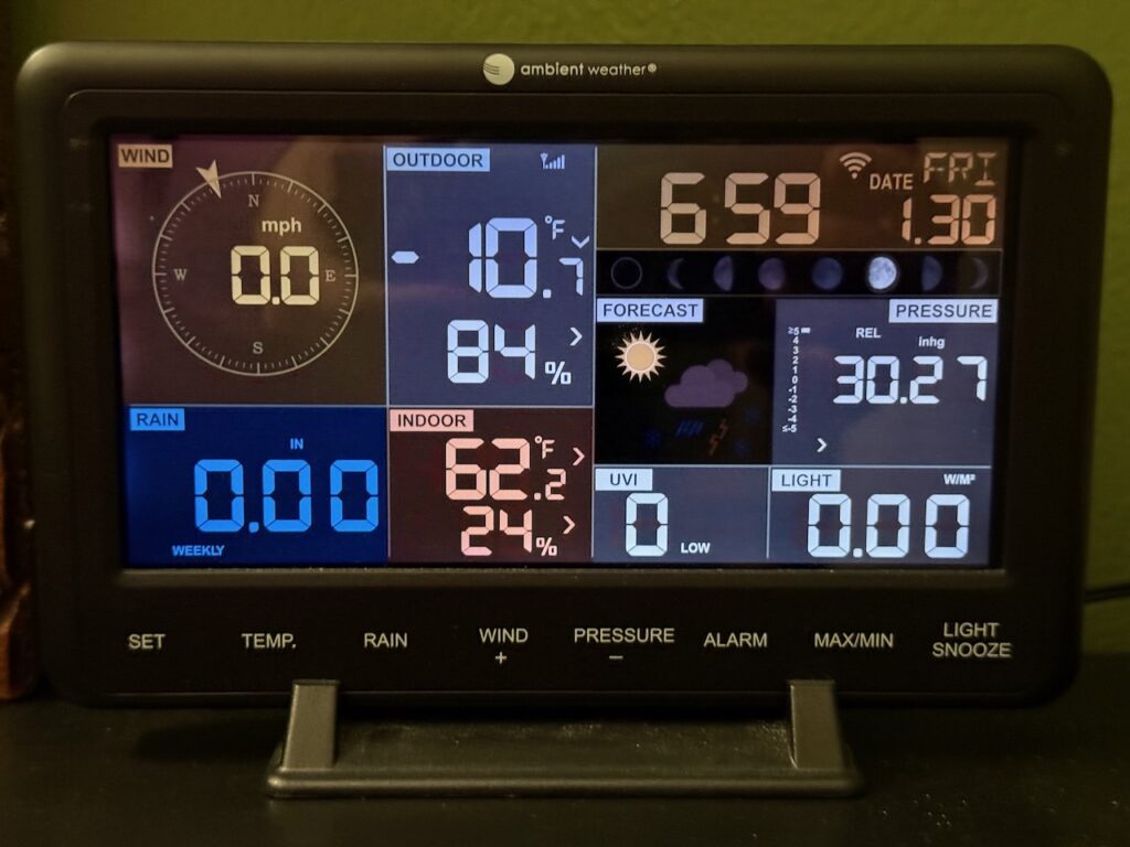 A photo of an Ambient Weather Station display shows an outdoor temperature of -10.7°F in Kent, Ohio at 6:59am on Friday, January 30, 2026
